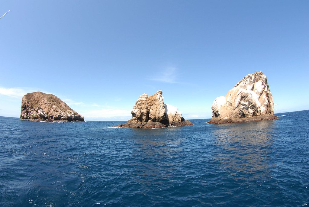 Gordon Rocks, three volcanic rock formations rising from the Pacific Ocean near Santa Cruz Island, Galápagos